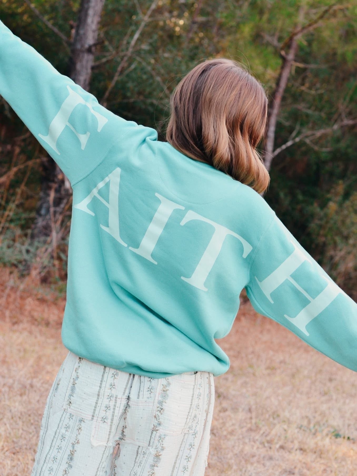 THE BELIEVER GRAPHIC SWEATSHIRTS