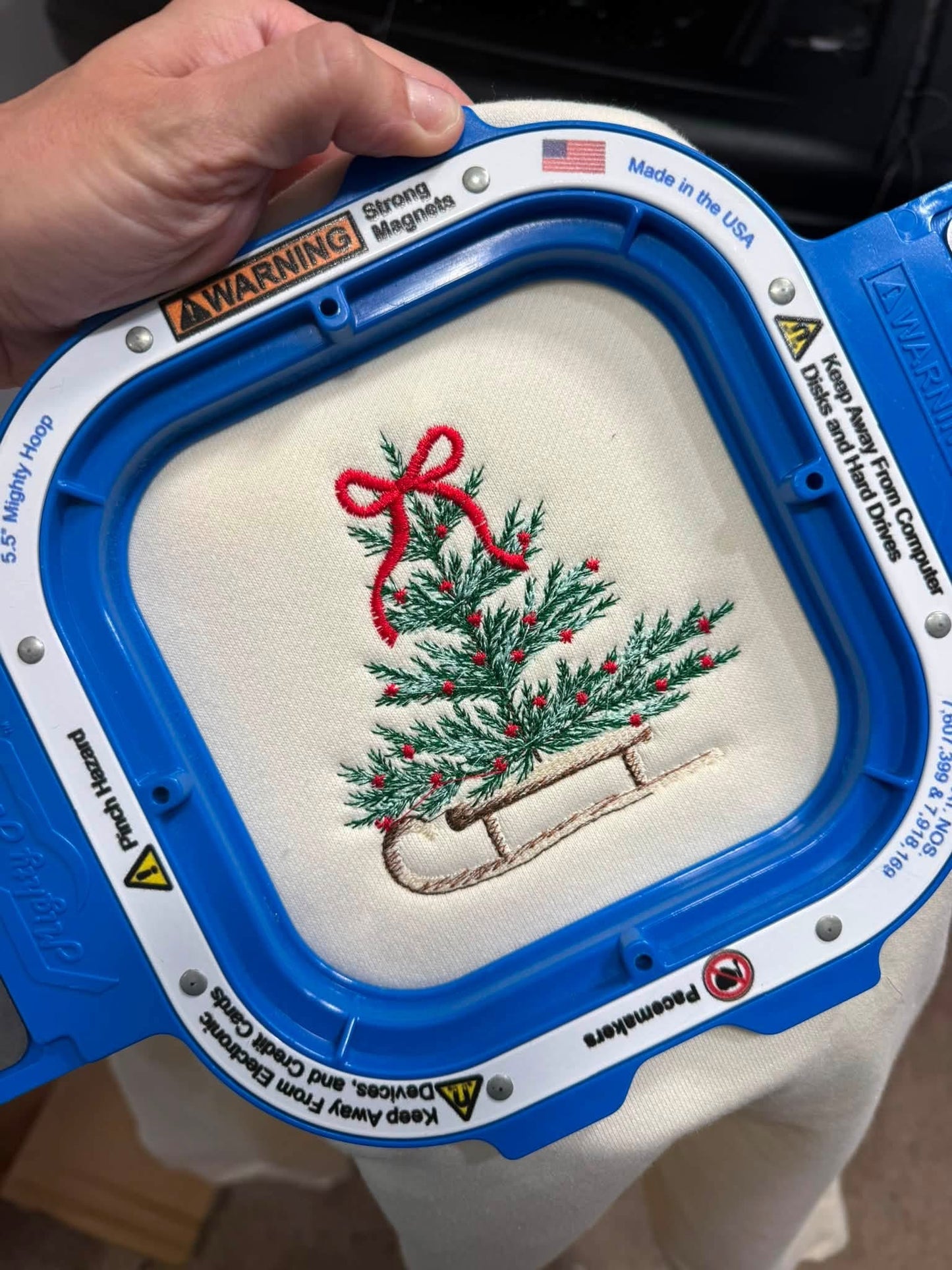 PREORDER THE SLED & TREE EMBROIDERED SWEATSHIRT