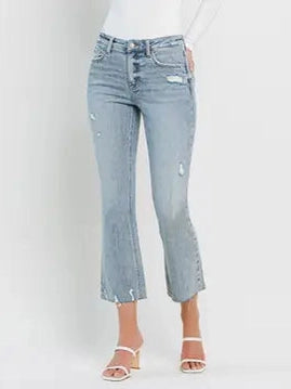 THE CALI DISTRESSED KICK FLARE CROP DENIM