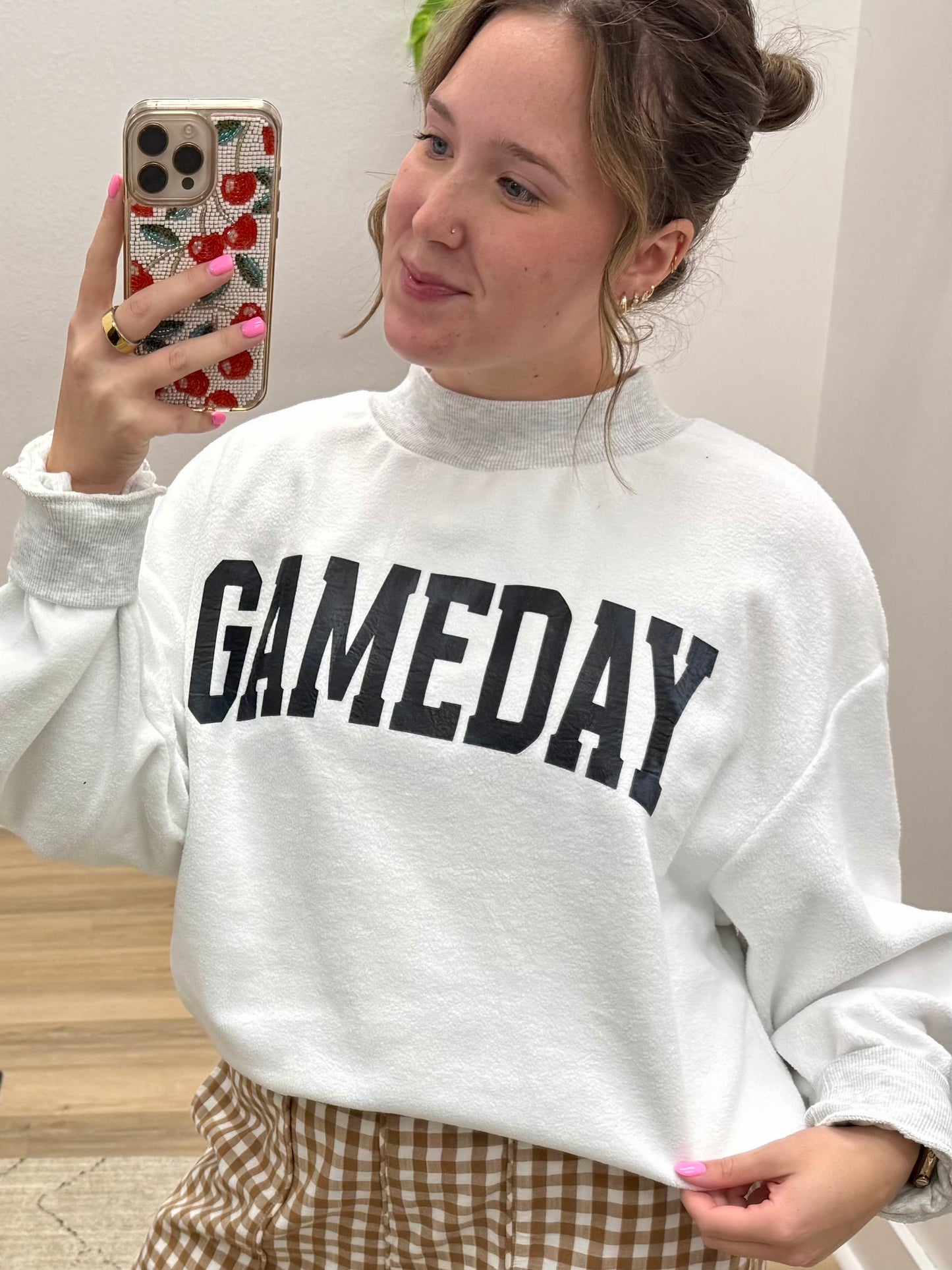 THE GAMEDAY REVERSIBLE MOCKNECK SWEATSHIRT