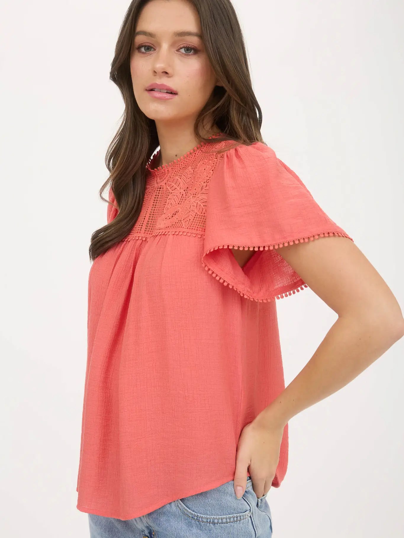 THE MARYBETH LACE YOKE POMPON BLOUSE - coral