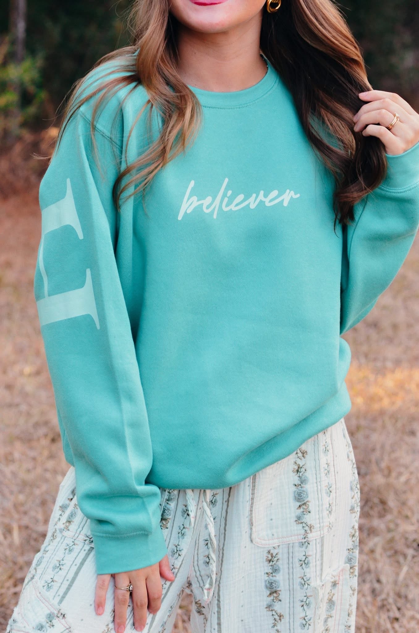 THE BELIEVER GRAPHIC SWEATSHIRTS