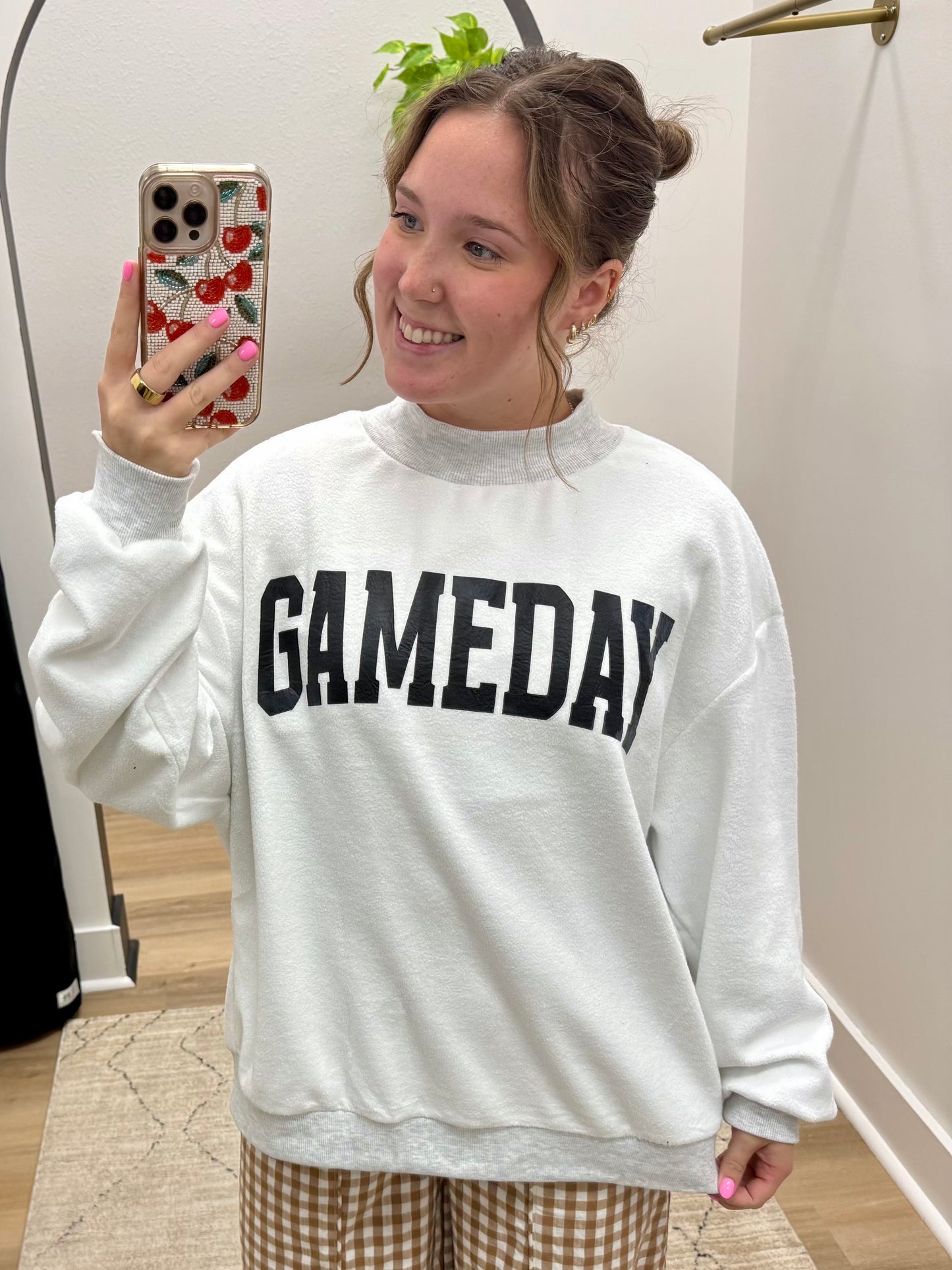 THE GAMEDAY REVERSIBLE MOCKNECK SWEATSHIRT