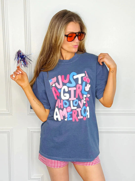THE JUST A GIRL GRAPHIC TEES