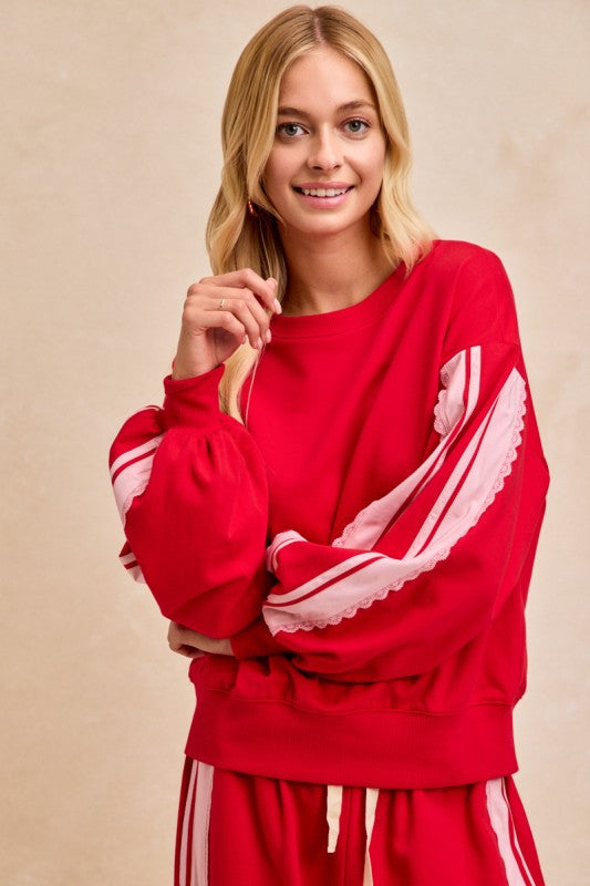 THE LOLA LACE TRIMMED RED OVERSIZED SWEATSHIRT