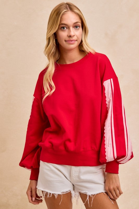 THE LOLA LACE TRIMMED RED OVERSIZED SWEATSHIRT
