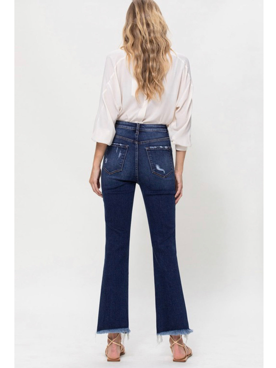THE CALI DARK WASH UNEVEN HEM STRAIGHT DENIM